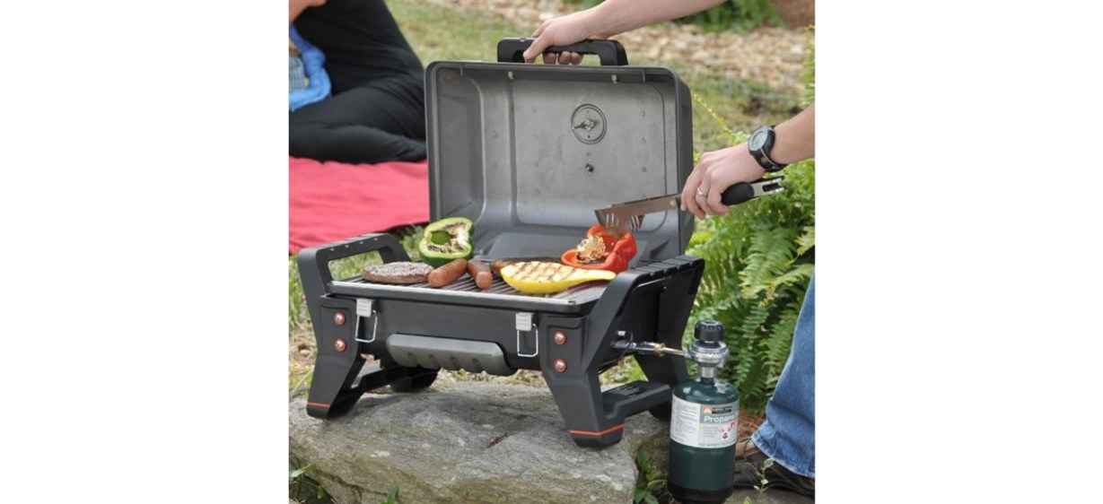 Person using Char-Broil Grill2Go X200