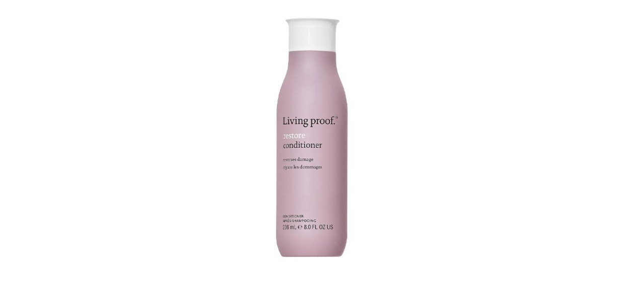 Purple bottle of Living Proof Restore Conditioner