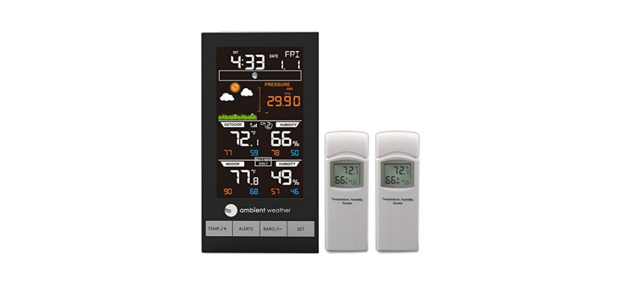 a detailed digital thermometer with various weather information and two remote sensors