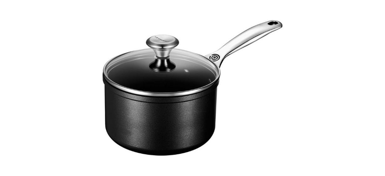 a black nonstick saucepan with a glass lid